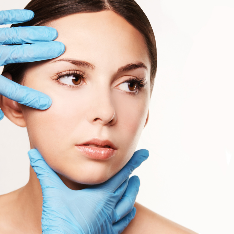 Facelift hydra treats. Esthetic skin care analysis. Doctor hands in gloves.
