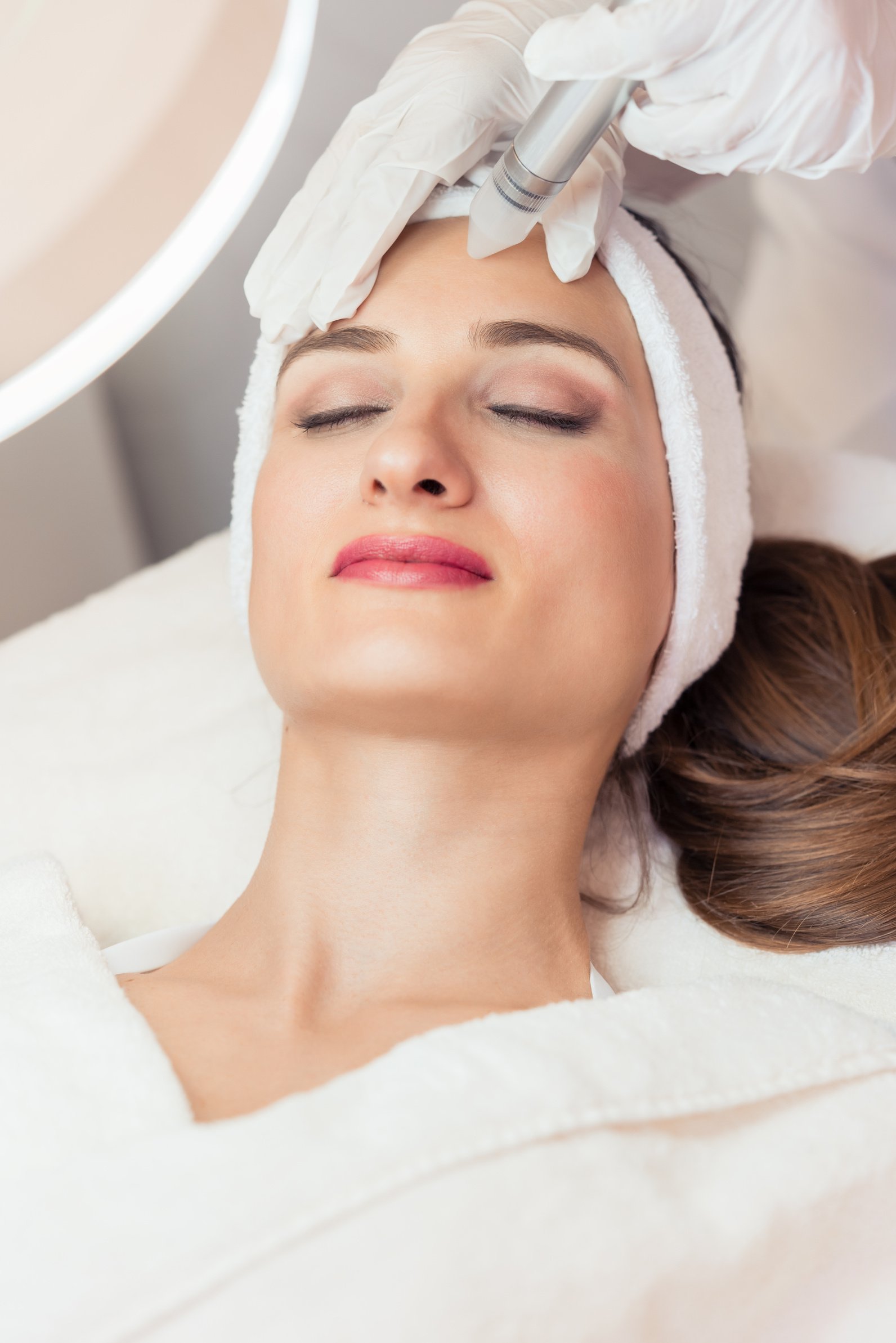 Face of a Beautiful Woman During Facial Treatment